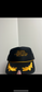 Bumper Sticker on a Bentley Hat